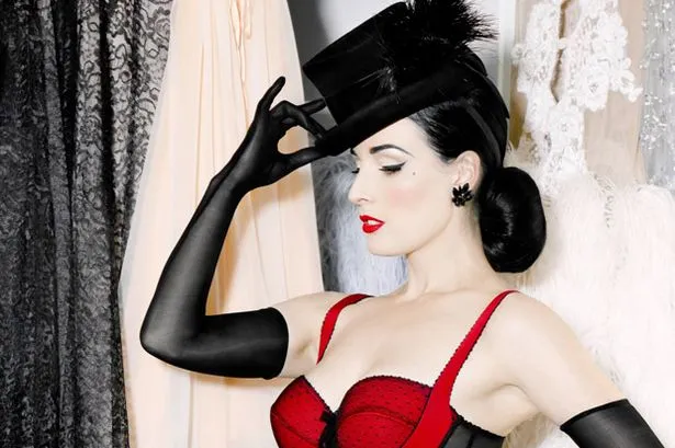 Dita Von Teese modeling the lingerie range she created for Aussie retailer Target